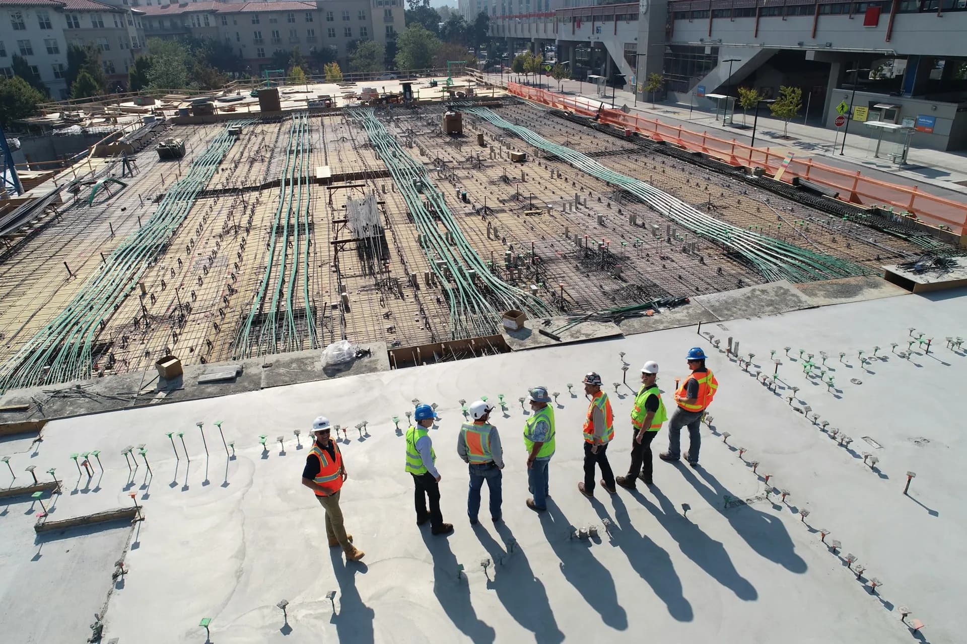 Site team reviewing works on a concrete deck